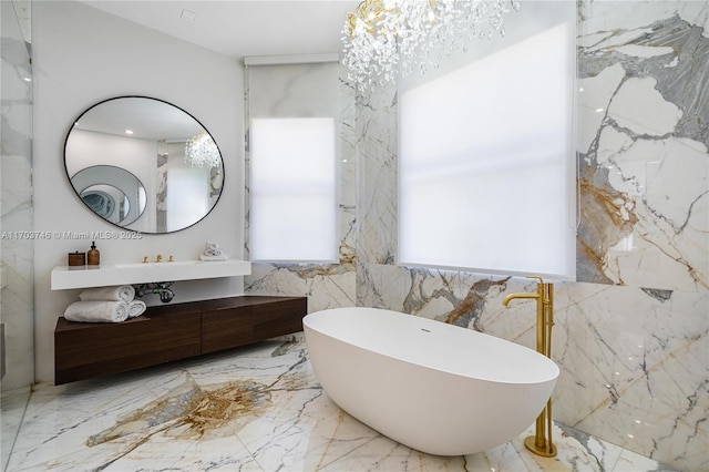 bathroom featuring vanity and a bathing tub