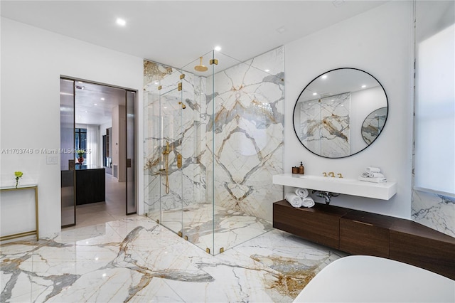 bathroom featuring a shower and vanity