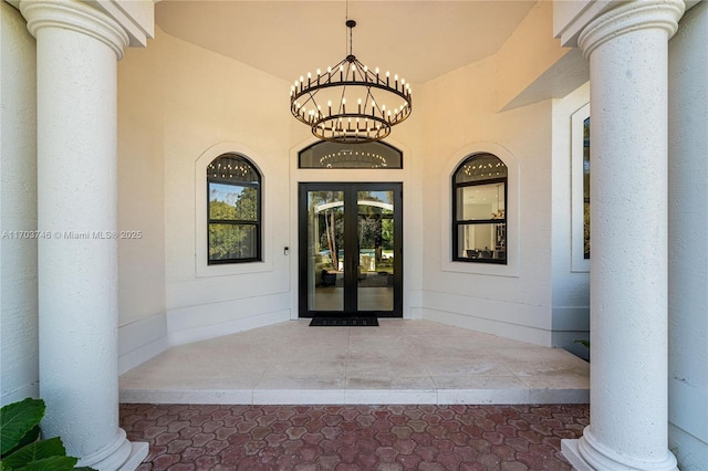 property entrance featuring french doors