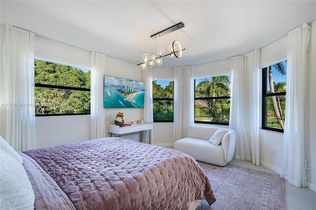 bedroom featuring a chandelier