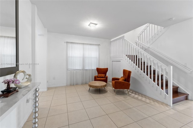 living area featuring light tile patterned floors