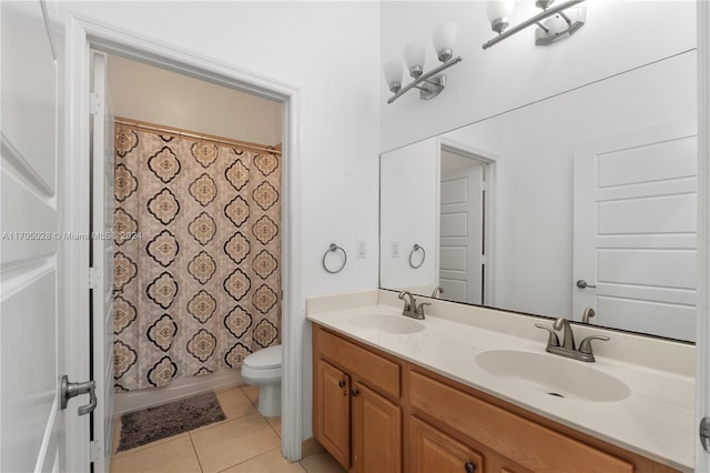 full bathroom with toilet, shower / bath combo, vanity, and tile patterned floors