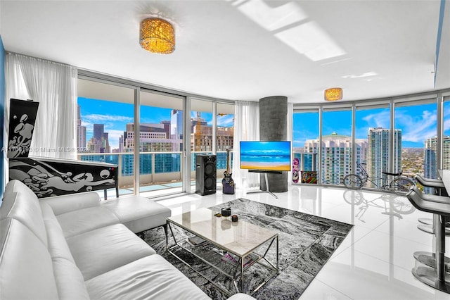 living room with tile patterned floors and expansive windows