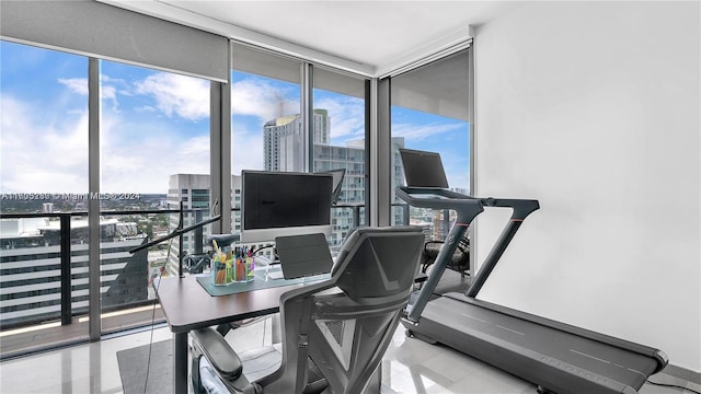 office area featuring floor to ceiling windows