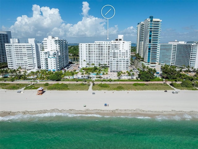 aerial view featuring a beach view and a water view