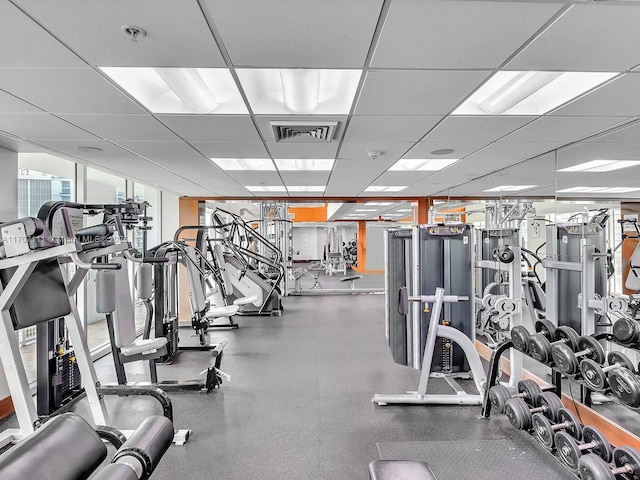 workout area with a drop ceiling