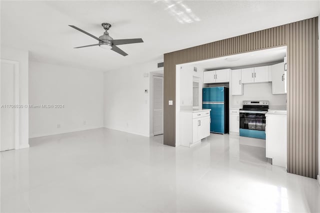 interior space with black refrigerator, a textured ceiling, ceiling fan, electric range, and white cabinetry