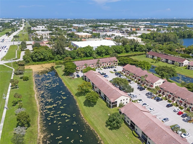 drone / aerial view featuring a water view