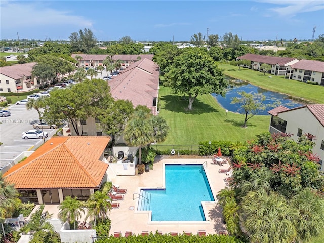 bird's eye view with a water view