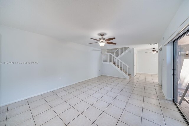 bathroom with ceiling fan, tile patterned flooring, vanity, and toilet