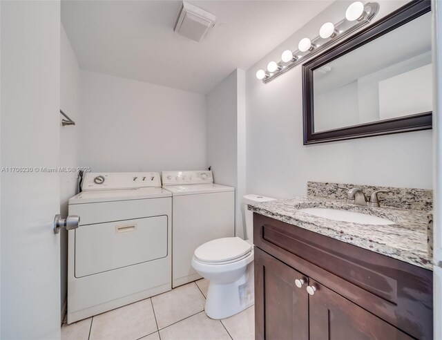 tiled foyer entrance with sink