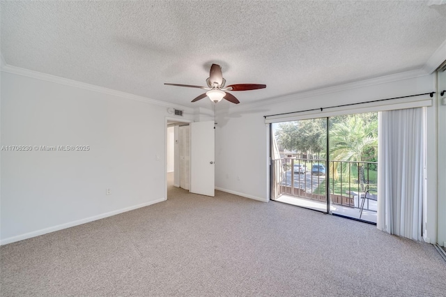 empty room featuring crown molding and light colored carpet