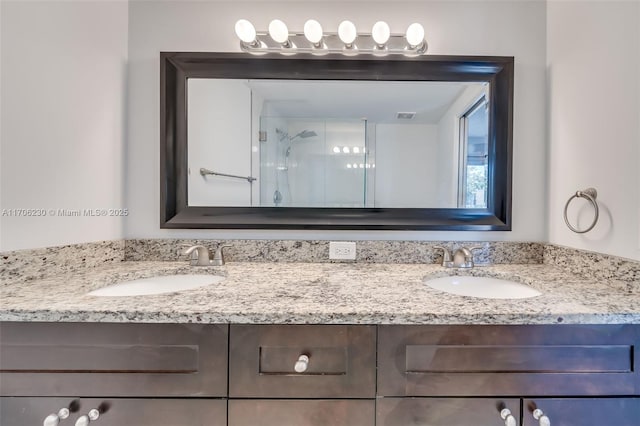 bathroom with vanity and an enclosed shower