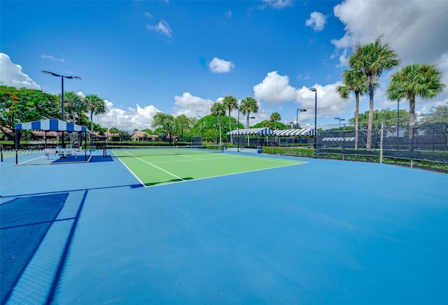 view of tennis court with basketball court