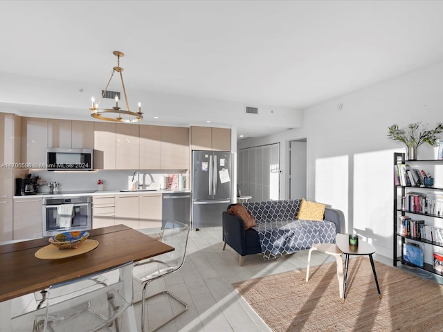 interior space featuring a notable chandelier and sink