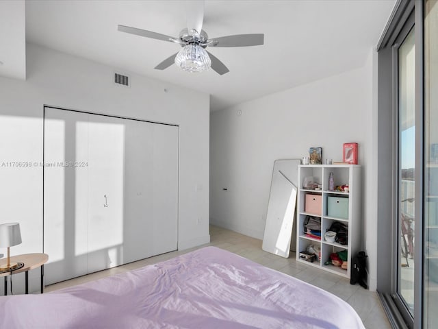 bedroom featuring a closet and ceiling fan