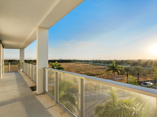 balcony featuring a rural view