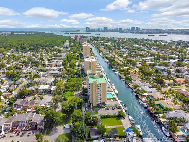 bird's eye view featuring a water view, a residential view, and a view of city