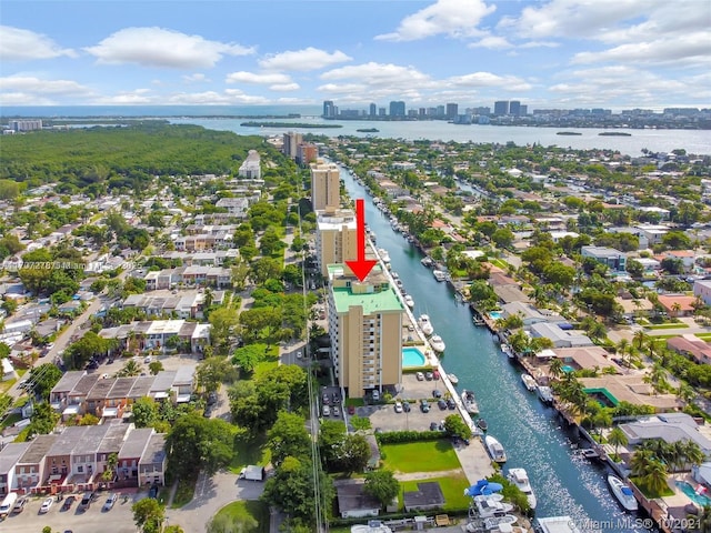 aerial view featuring a view of city, a residential view, and a water view