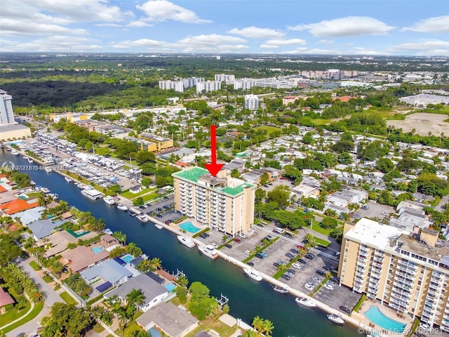 birds eye view of property featuring a water view