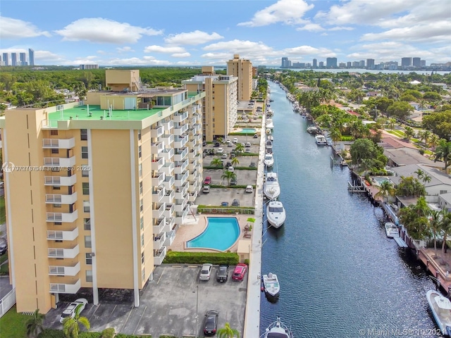 drone / aerial view with a water view and a view of city