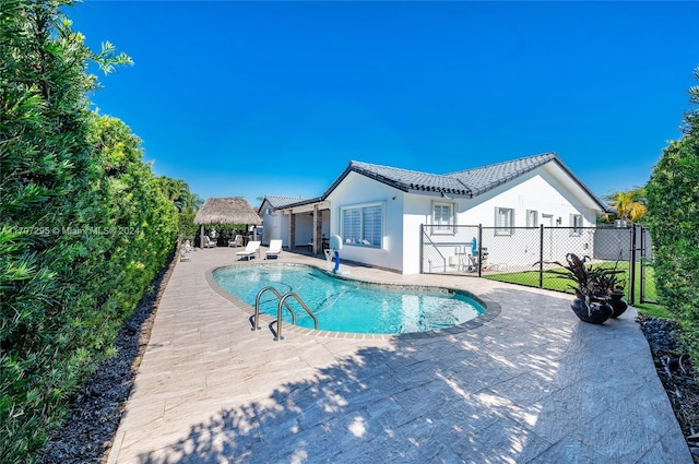 view of swimming pool featuring a patio