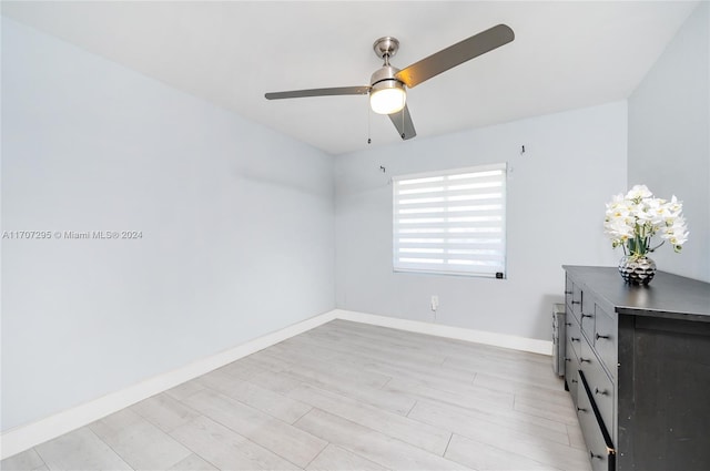 interior space featuring ceiling fan and light wood-type flooring