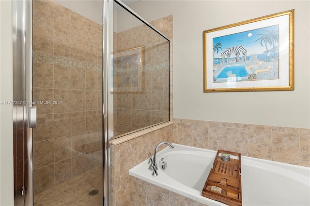 bathroom featuring plus walk in shower