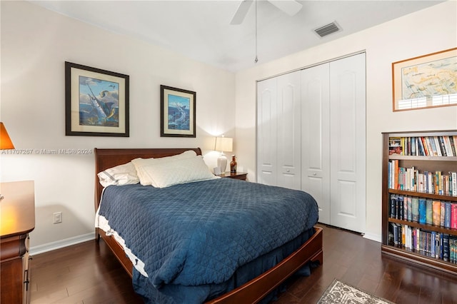 bedroom featuring ceiling fan, a closet, and dark hardwood / wood-style floors