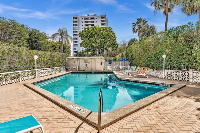 view of swimming pool with a patio area