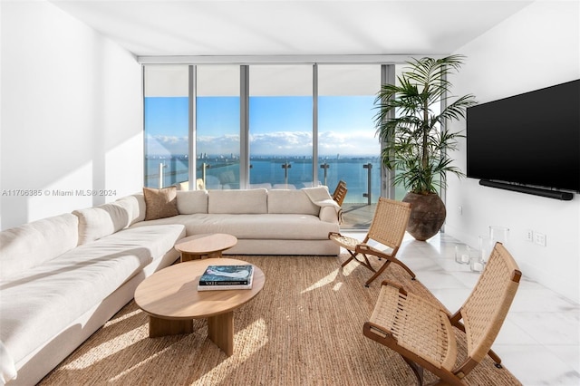 living room with floor to ceiling windows