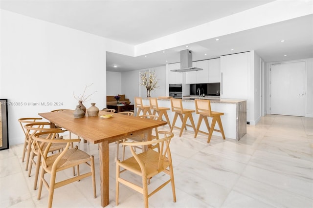 dining space featuring sink