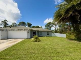 view of front of home with a front lawn