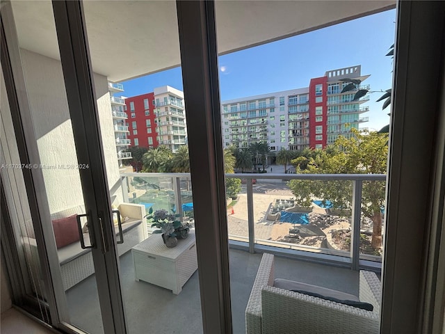 balcony featuring french doors