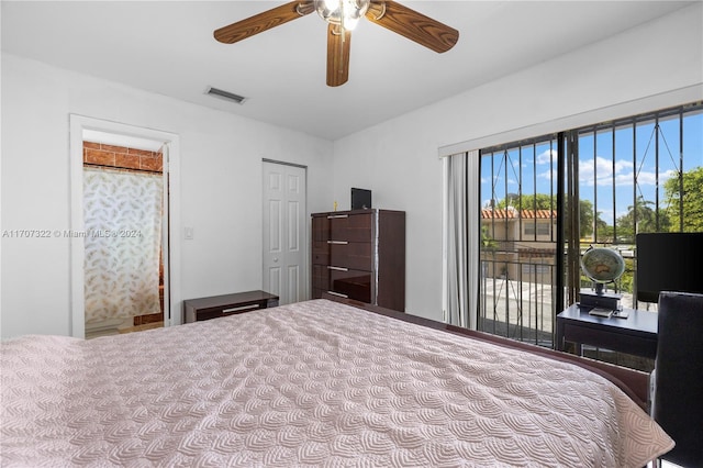 unfurnished bedroom featuring access to outside and ceiling fan