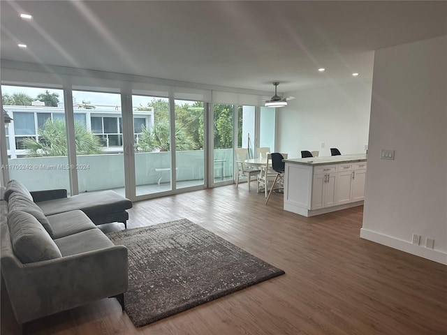 10210 Collins Ave Unit 306, Bal Harbour, FL 33154 - living room with light wood-type flooring, recessed lighting, and a ceiling fan
