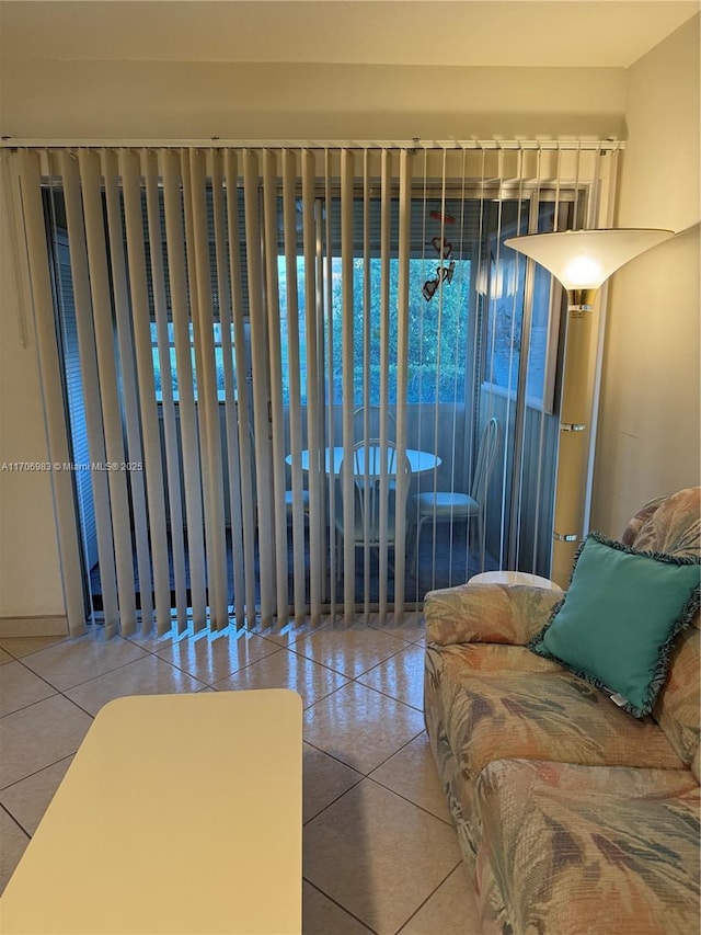 living room with tile patterned floors