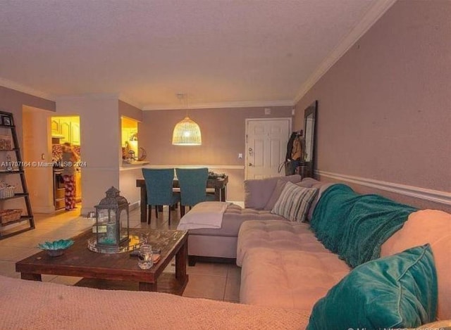 tiled living room with ornamental molding