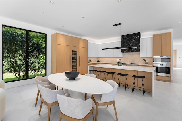 dining area featuring a wealth of natural light and recessed lighting