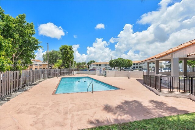 view of pool featuring a patio area