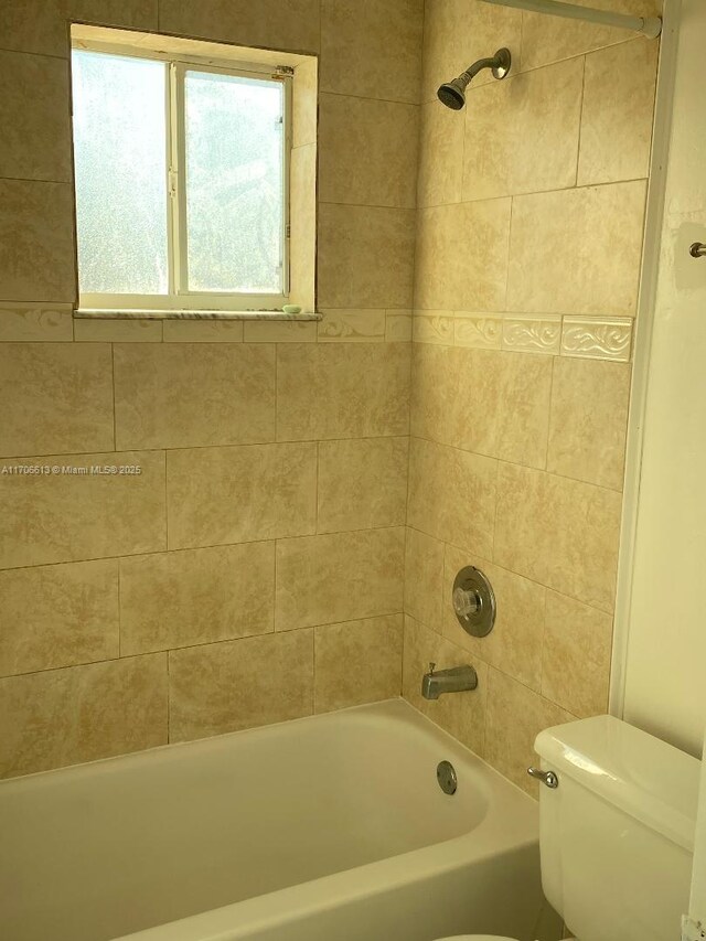 bathroom featuring tile patterned flooring and toilet