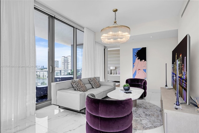 living room with an inviting chandelier