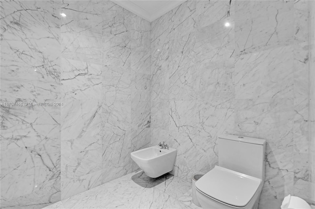 bathroom with toilet, tile walls, and a bidet