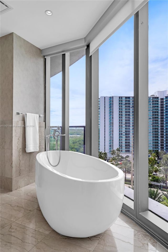 bathroom featuring a washtub