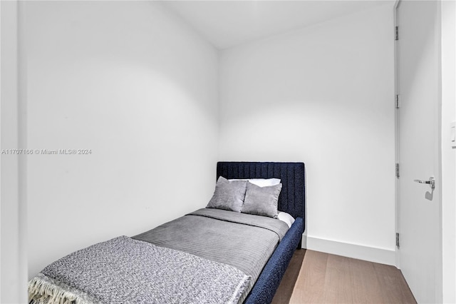 bedroom featuring hardwood / wood-style flooring