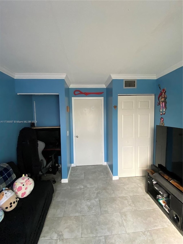 living room featuring crown molding