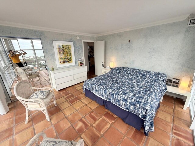 tiled bedroom featuring ornamental molding