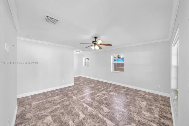 unfurnished room with ceiling fan and crown molding