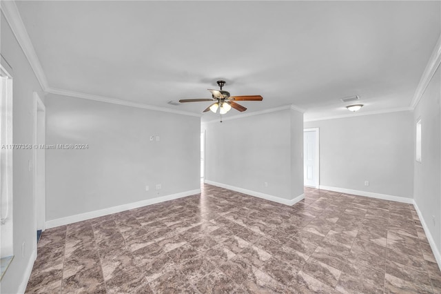 empty room featuring ceiling fan and ornamental molding