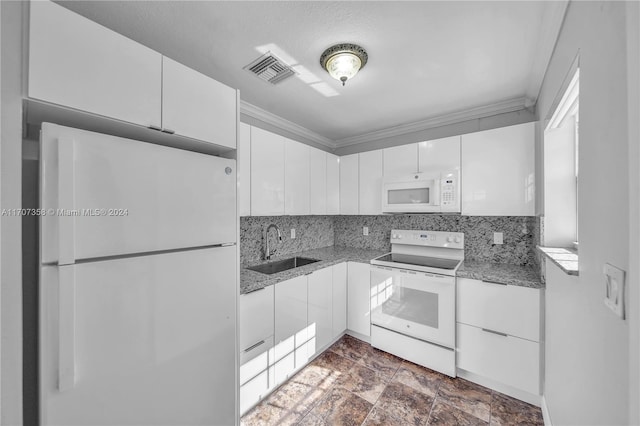 kitchen with white cabinets, white appliances, sink, and stone counters